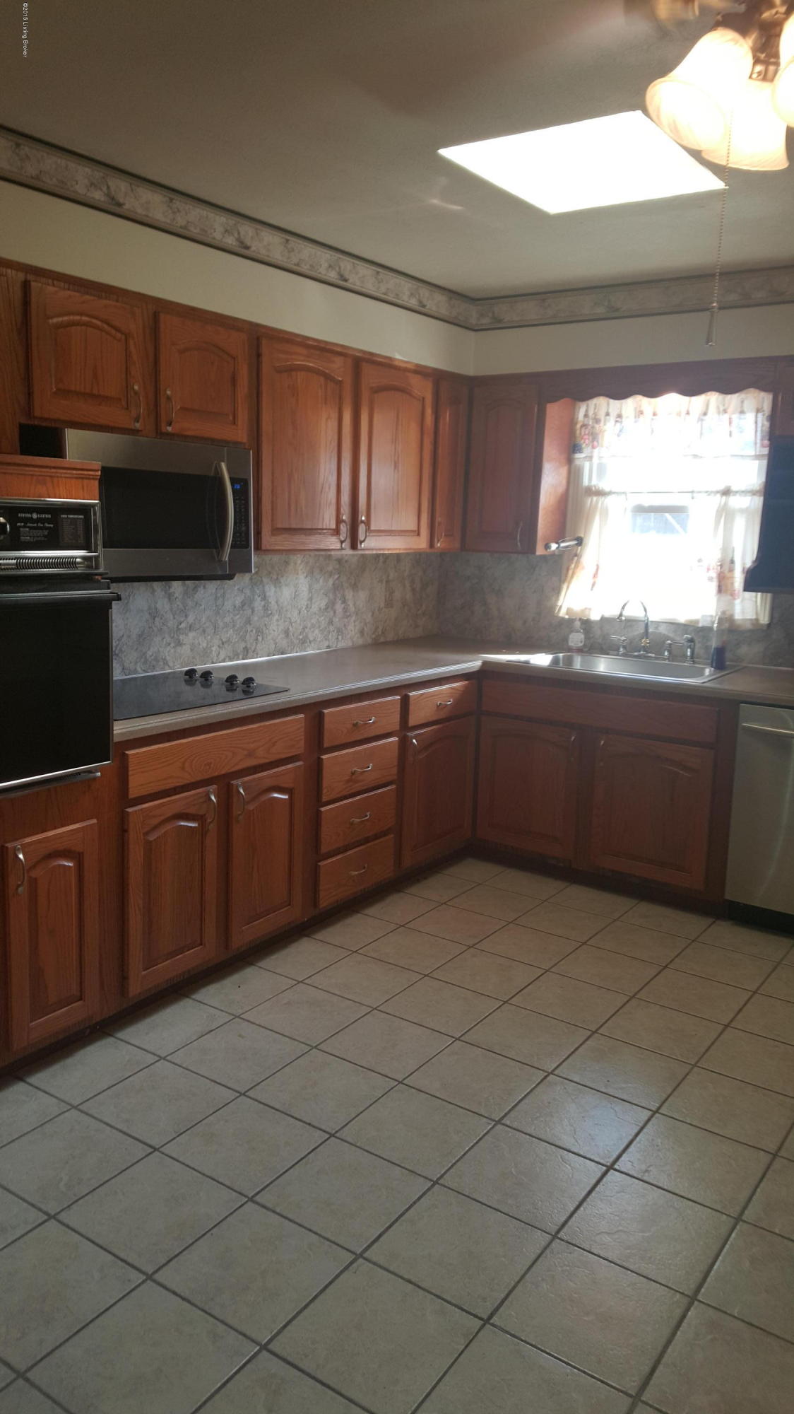 8906 Blue Lick Road Louisville, KY 40219 - Photo 7 of 14 Large eat in kitchen oak cabinets new appliances