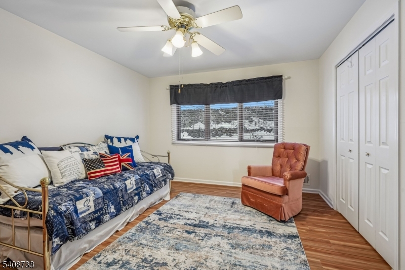 27 Espy Road, Unit A7 Caldwell, NJ 07006 - Photo 17 of 29 a living room with furniture rug and wooden floor