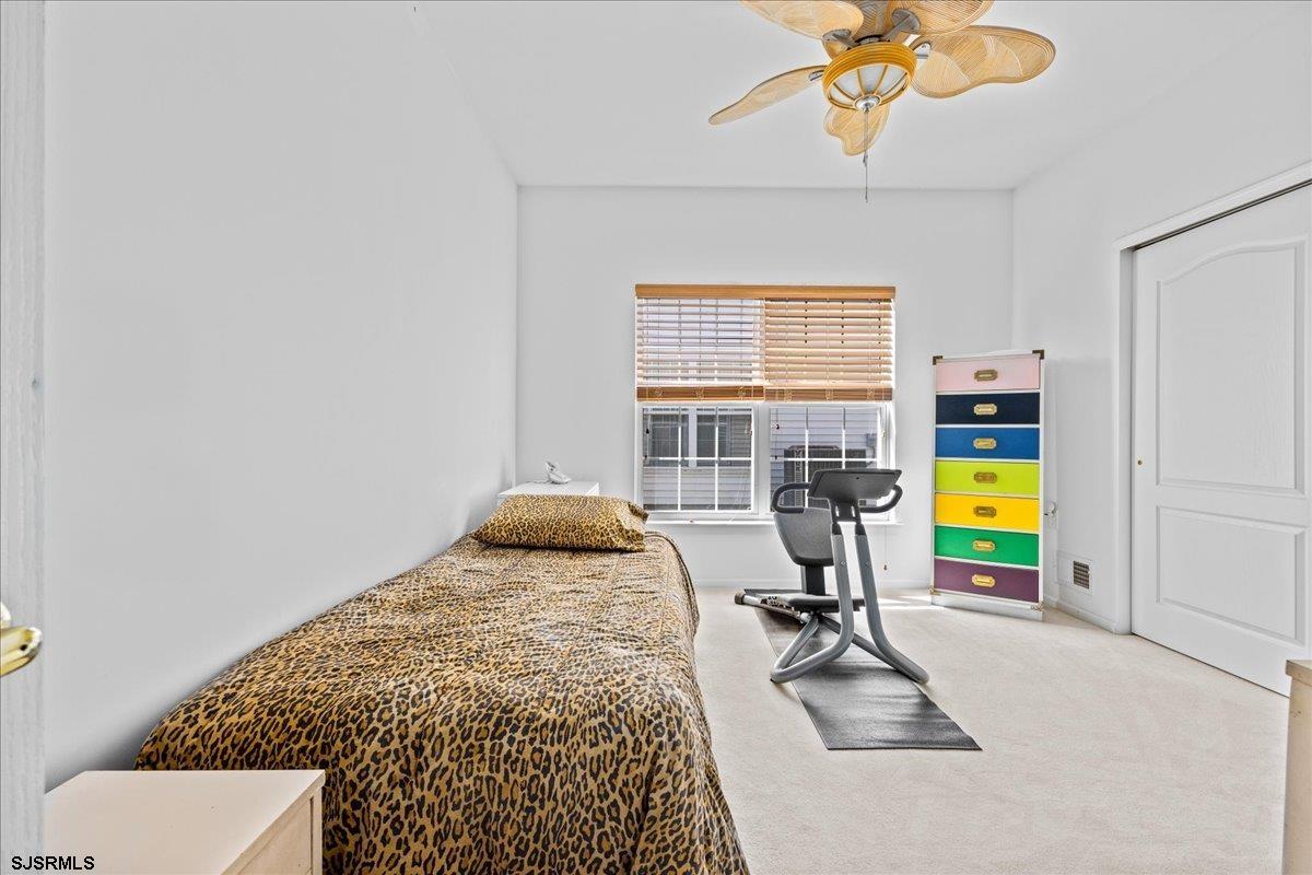 1 Butler Road Egg Harbor Township, NJ 08234 - Photo 20 of 39 a view of a bedroom with a bed and toys
