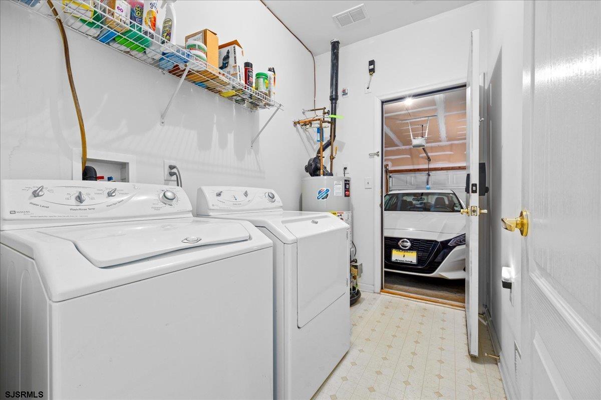 1 Butler Road Egg Harbor Township, NJ 08234 - Photo 21 of 39 a utility room with dryer and washer
