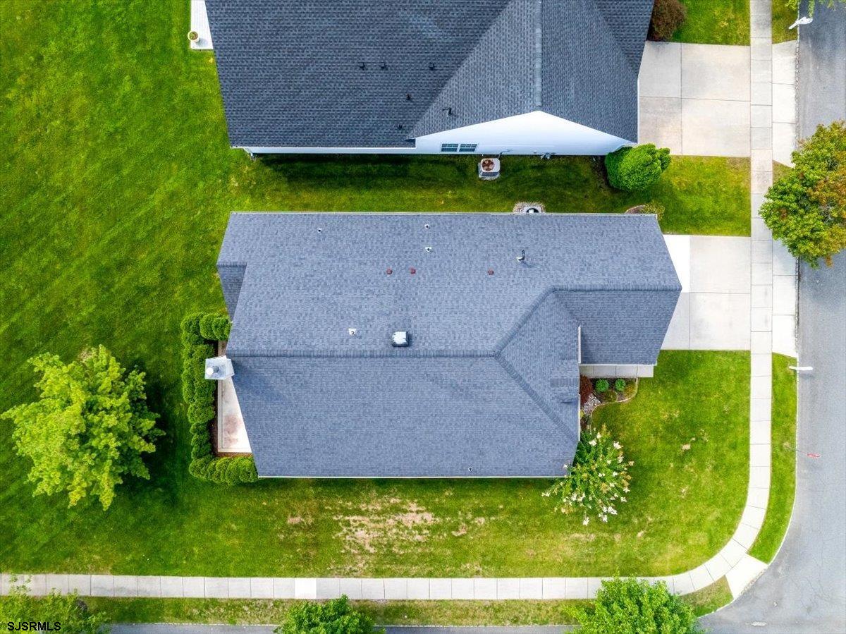 1 Butler Road Egg Harbor Township, NJ 08234 - Photo 24 of 39 a wooden bench sitting in a yard
