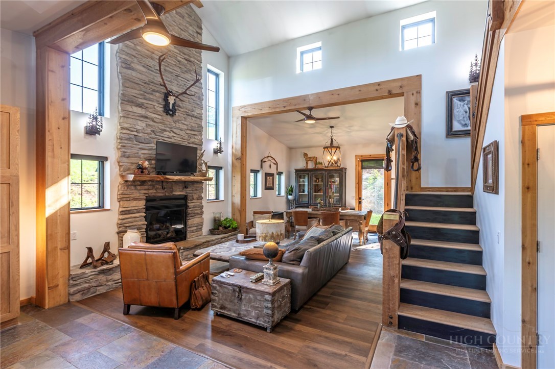 509 Grant Houck Road Todd, NC 28684 - Photo 20 of 43 a living room with furniture and a fireplace