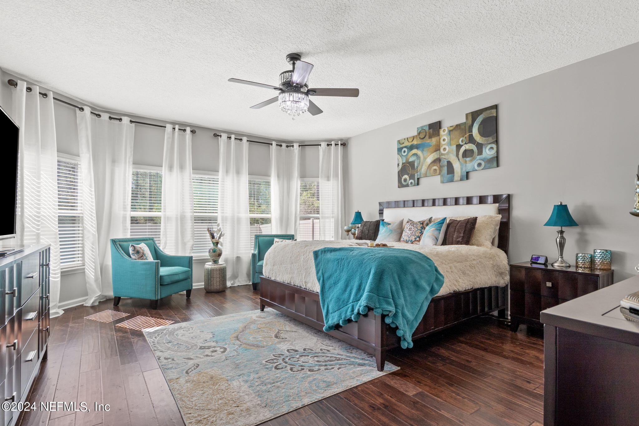 4459 Quail Hollow Road Orange Park, FL 32065 - Photo 17 of 37 a bedroom with a bed and a couch