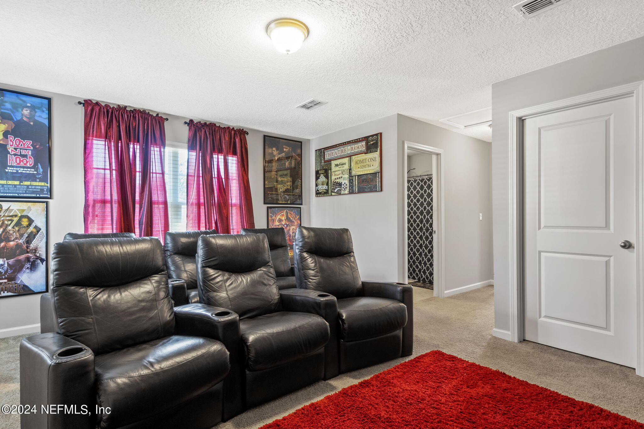 4459 Quail Hollow Road Orange Park, FL 32065 - Photo 25 of 37 a living room with furniture and a rug