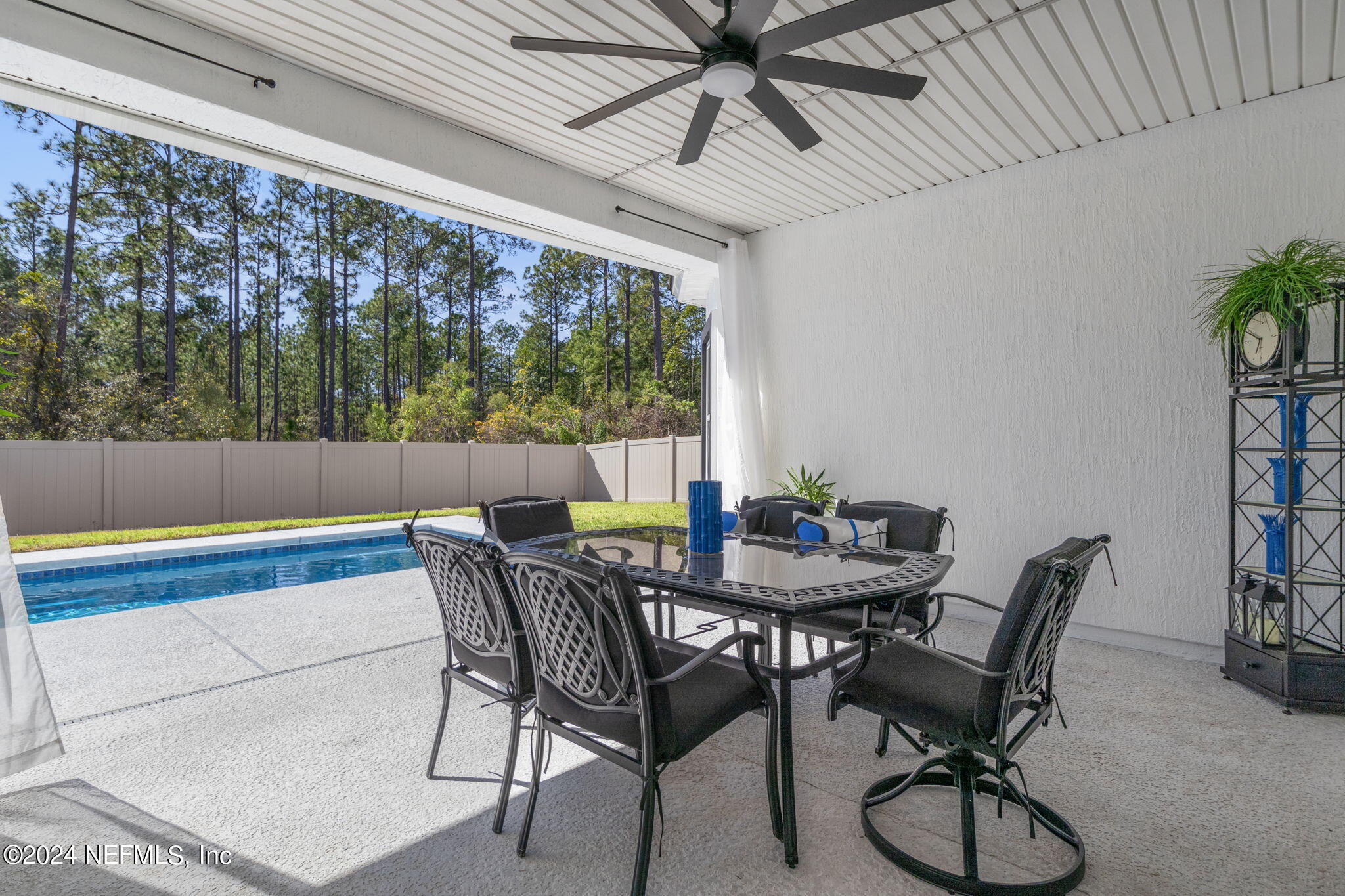 4459 Quail Hollow Road Orange Park, FL 32065 - Photo 28 of 37 a view of a dining room with furniture window and outside view
