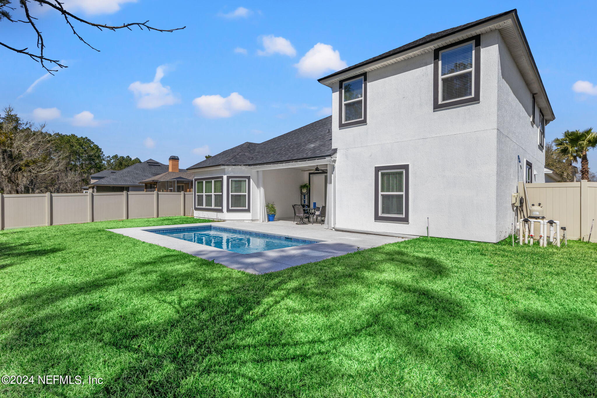 4459 Quail Hollow Road Orange Park, FL 32065 - Photo 34 of 37 a view of a house with a backyard