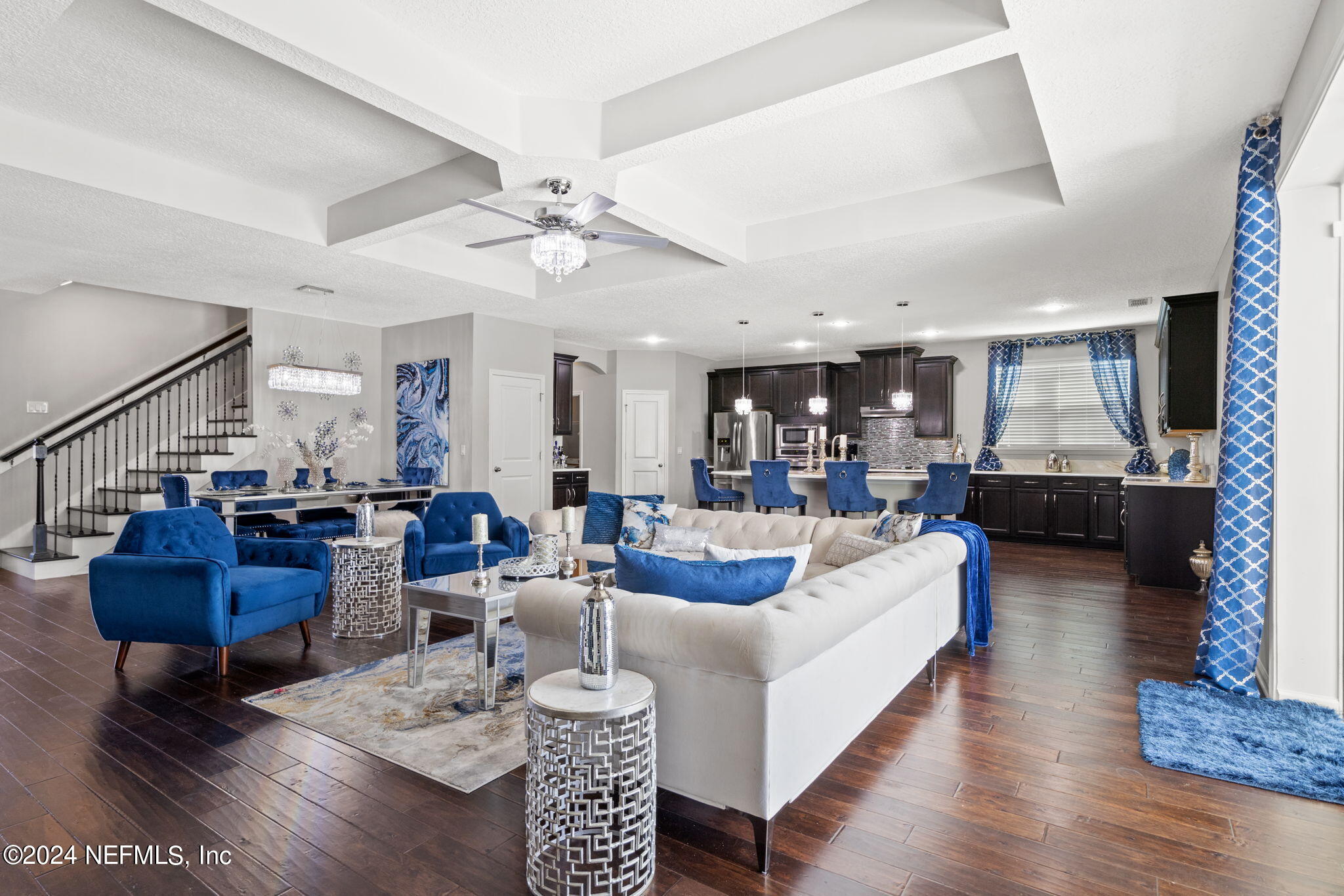 4459 Quail Hollow Road Orange Park, FL 32065 - Photo 8 of 37 a living room with fireplace furniture and a wooden floor