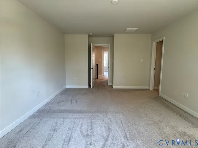 a view of a room with an empty space