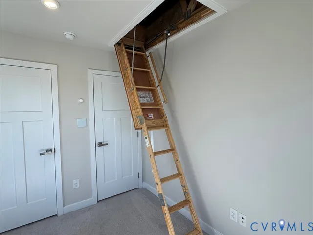 a view of an entryway with stairs