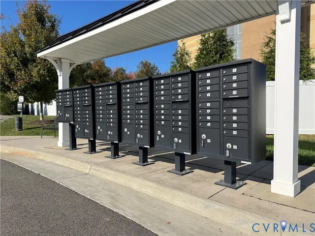 a view of a building with potted plants
