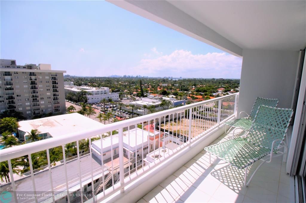9341 Collins Avenue, Unit 1003 Surfside, FL 33154 - Photo 14 of 24 a view of a balcony with city view