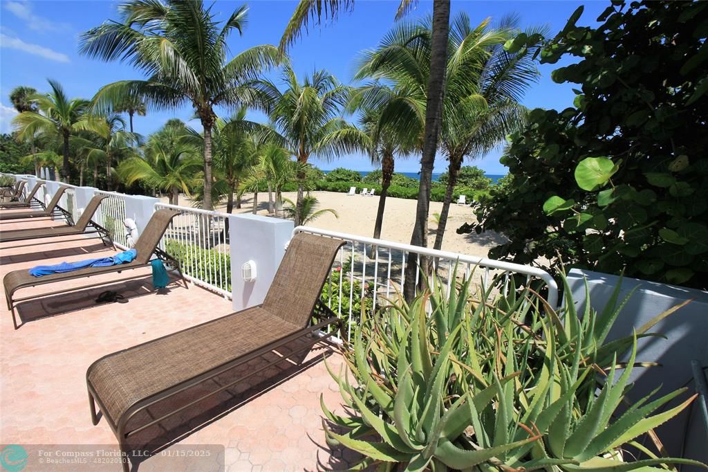 9341 Collins Avenue, Unit 1003 Surfside, FL 33154 - Photo 21 of 24 a view of outdoor space with seating area