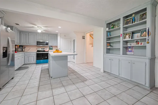 a kitchen with stainless steel appliances cabinets and a kitchen