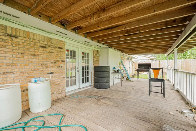 a view of a garden with a building in the background