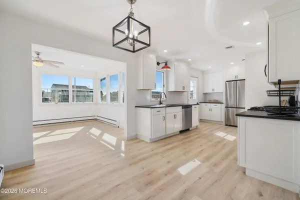 an empty room with a empty space and window