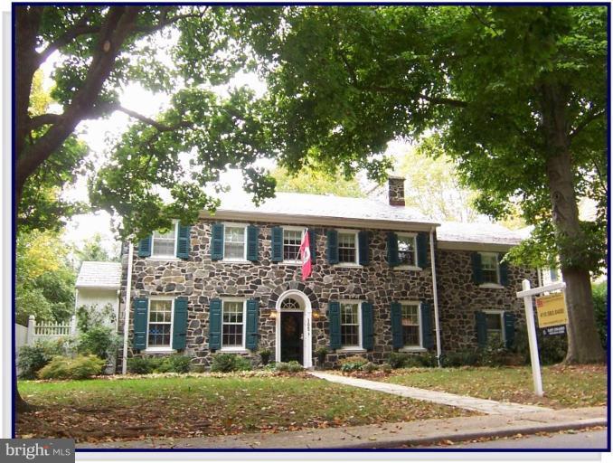 105 Taplow Road Baltimore, MD 21212 - Photo 1 of 14 a front view of a house with garden