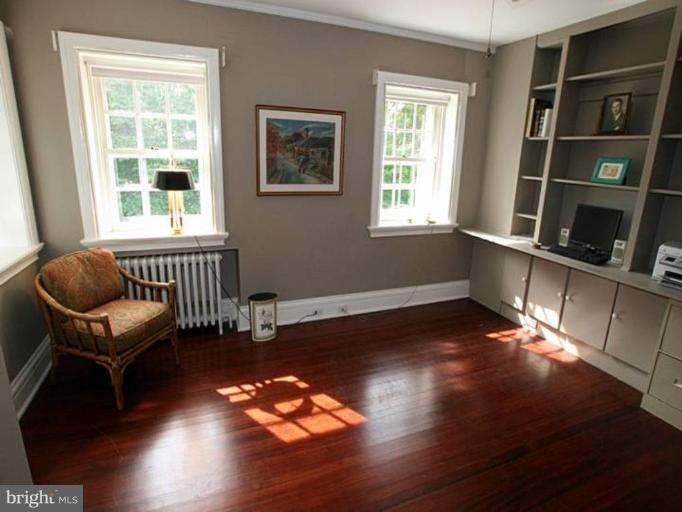 105 Taplow Road Baltimore, MD 21212 - Photo 11 of 14 a room with furniture and a window