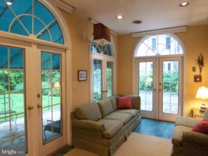 105 Taplow Road Baltimore, MD 21212 - Photo 4 of 14 a living room with furniture and a large window