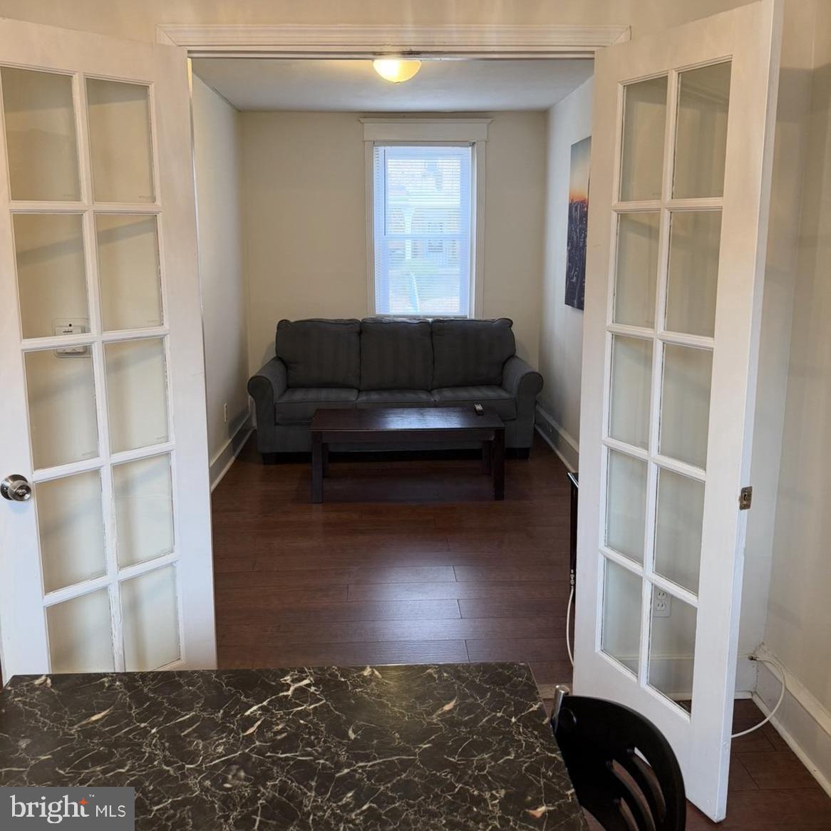 929 Edgemore Road Philadelphia, PA 19151 - Photo 15 of 16 a living room with a furniture and a window