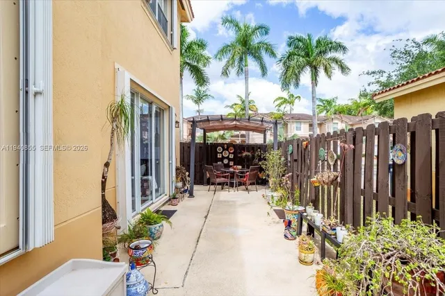 a view of outdoor space with deck and furniture
