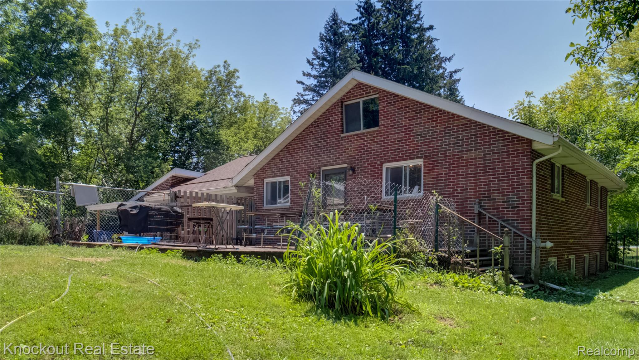 4195 Williamson Road Saginaw, MI 48601 - Photo 39 of 50 Brick exterior with a gabled roofline
