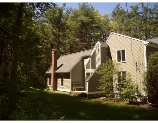 66 South Shaker Road Harvard, MA 01451 - Photo 3 of 26 a view of a white house with a yard