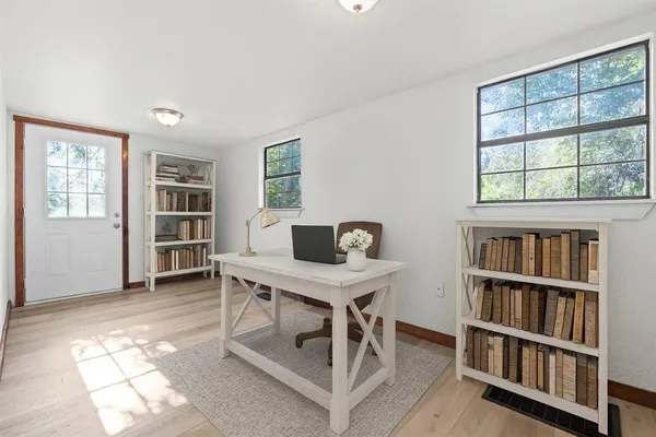 a view of an empty room with a window