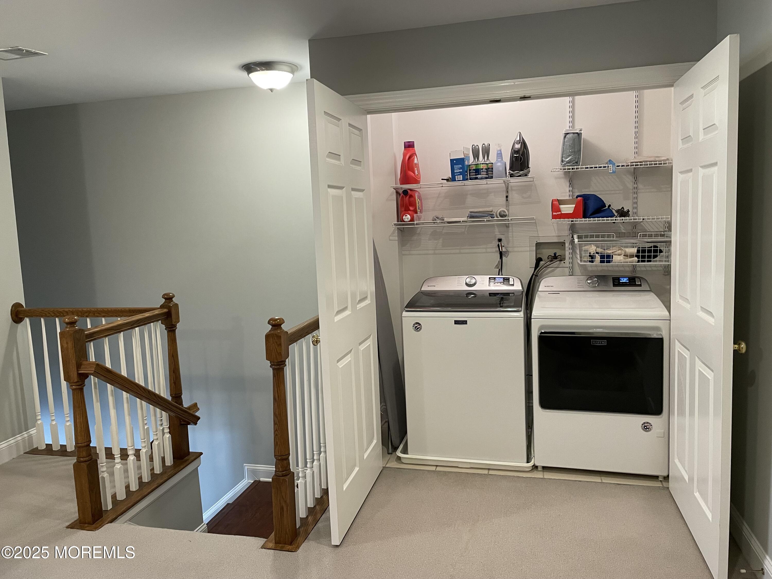 508 Abby Road Middletown, NJ 07748 - Photo 13 of 17 a utility room with cabinets dryer and washer