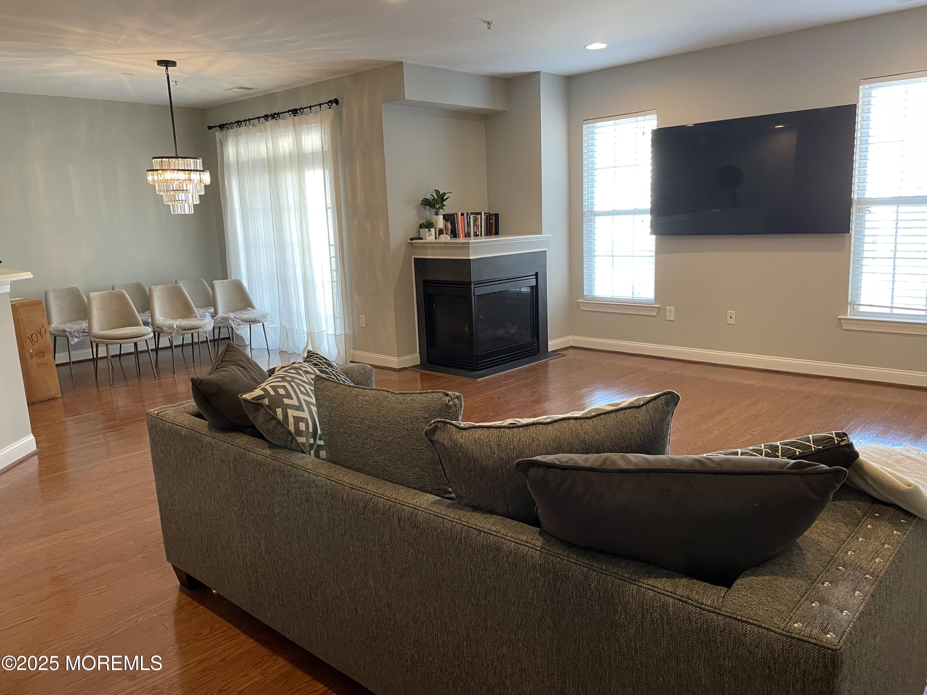 508 Abby Road Middletown, NJ 07748 - Photo 4 of 17 a living room with furniture and a flat screen tv