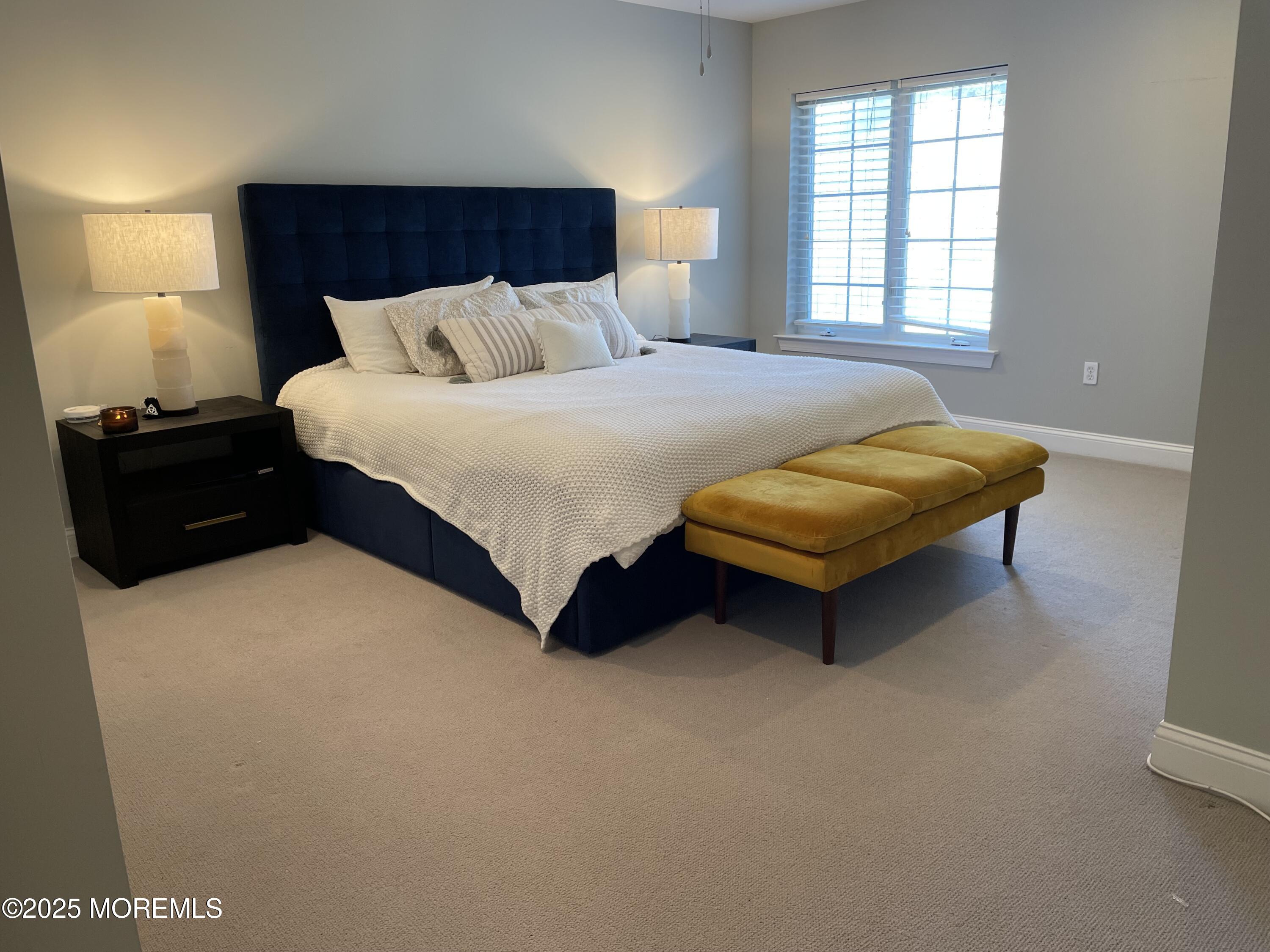 508 Abby Road Middletown, NJ 07748 - Photo 10 of 17 a bedroom with a bed and a couch