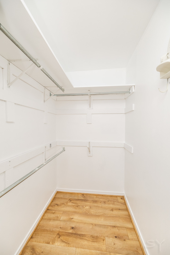 211 East Ohio Street, Unit 2606 Chicago, IL 60611 - Photo 27 of 32 a view of a room with empty racks