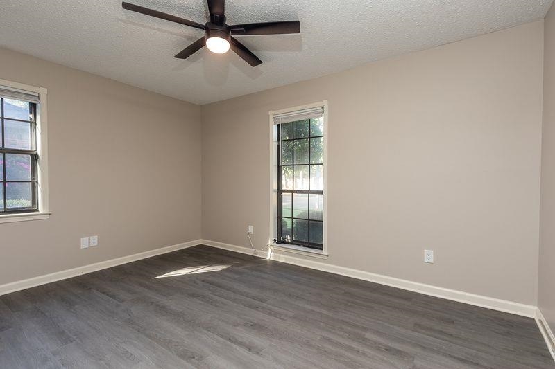1780 Allenby Road Germantown, TN 38139 - Photo 18 of 26 a view of empty room with wooden floor and fan