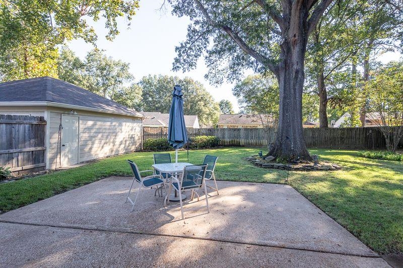 1780 Allenby Road Germantown, TN 38139 - Photo 22 of 26 a view of a house with backyard and a tree
