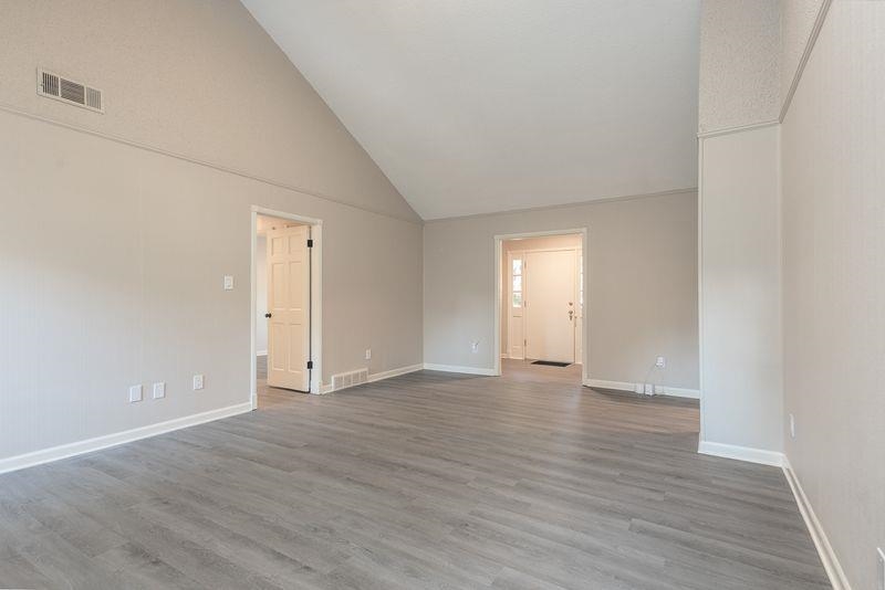 1780 Allenby Road Germantown, TN 38139 - Photo 9 of 26 a view of an empty room and wooden floor