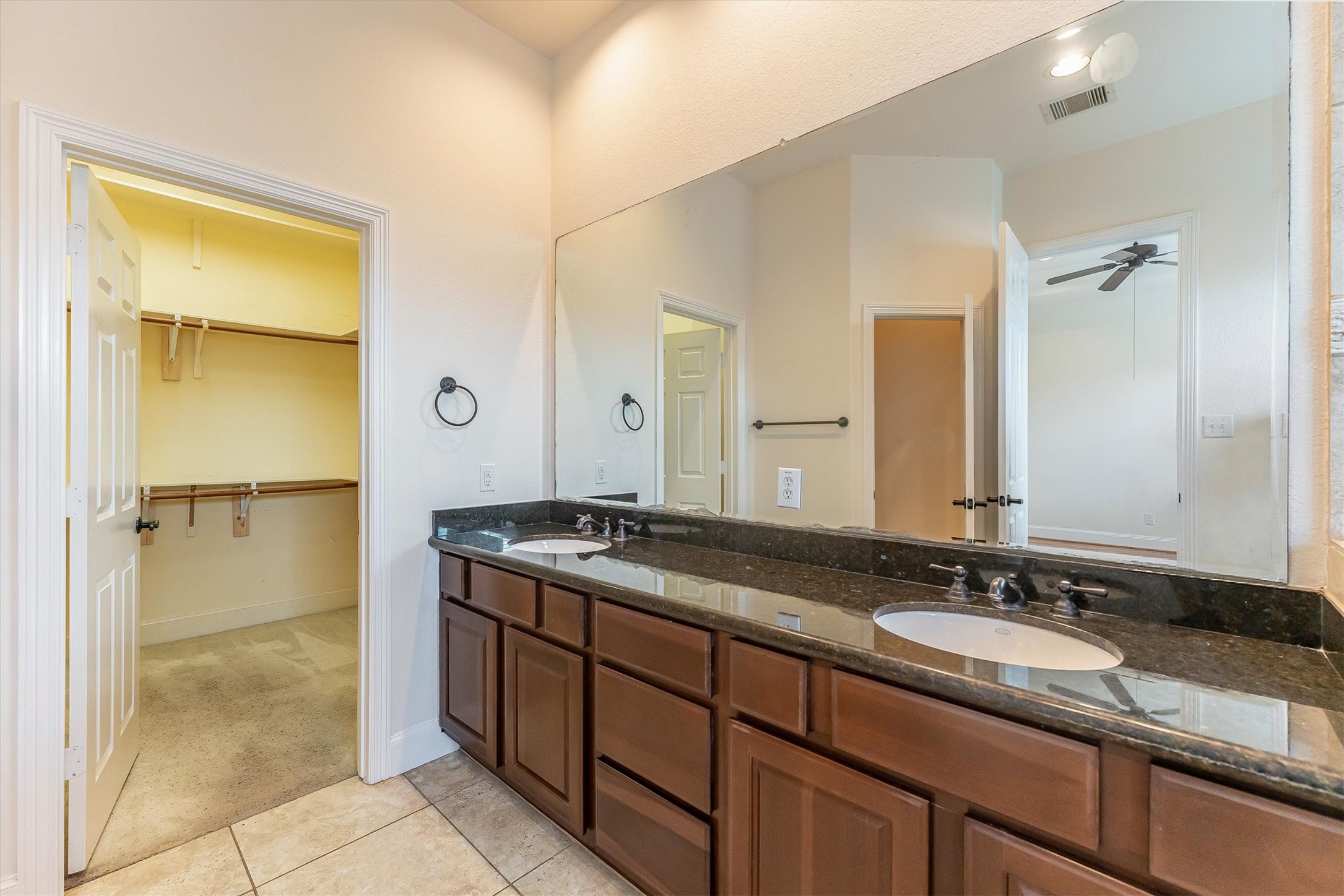 308 Grove Street Houston, TX 77020 - Photo 21 of 28 a bathroom with a granite countertop sink and a mirror