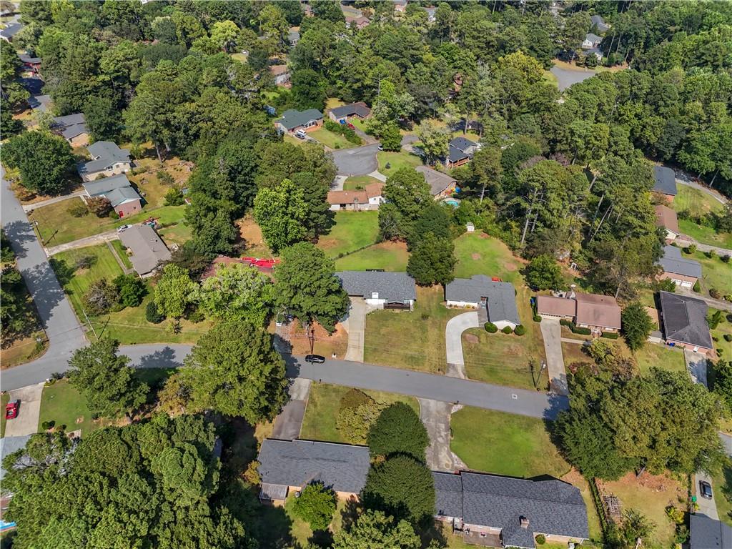 4166 Idlevale Drive Tucker, GA 30084 - Photo 11 of 36 an aerial view of residential houses with outdoor space and trees