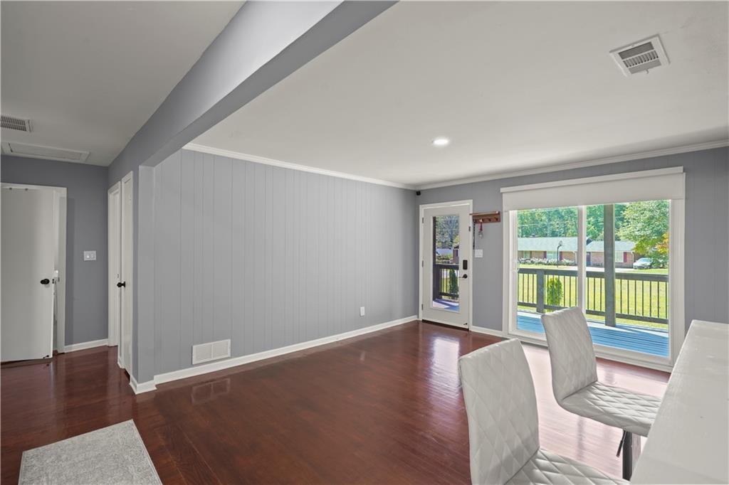 4166 Idlevale Drive Tucker, GA 30084 - Photo 14 of 36 a view of a room with furniture and wooden floor