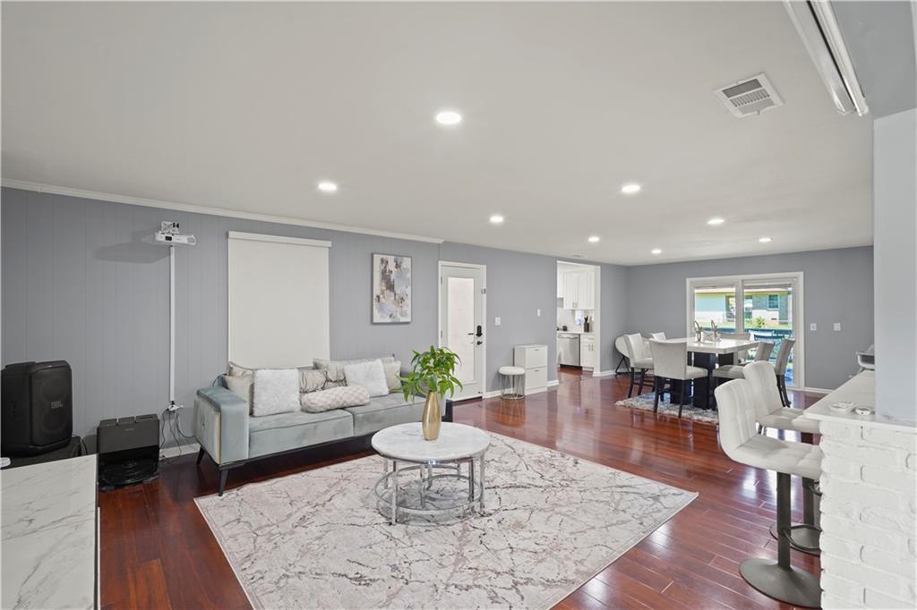 4166 Idlevale Drive Tucker, GA 30084 - Photo 19 of 36 a living room with furniture a rug and a table