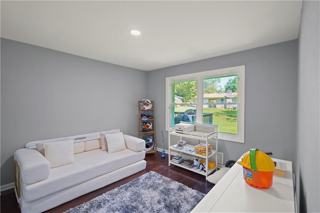 4166 Idlevale Drive Tucker, GA 30084 - Photo 30 of 36 a living room with furniture and a table