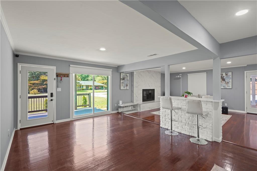 4166 Idlevale Drive Tucker, GA 30084 - Photo 35 of 36 a living room with furniture and a large window