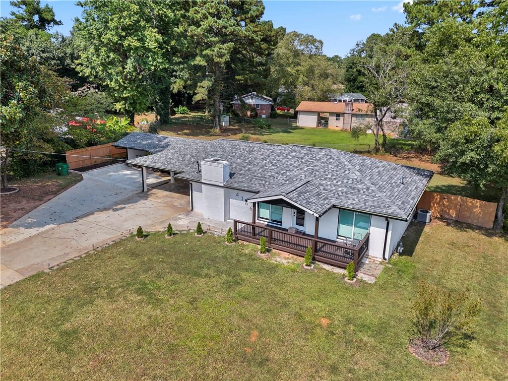 4166 Idlevale Drive Tucker, GA 30084 - Photo 4 of 36 a front view of a house with garden