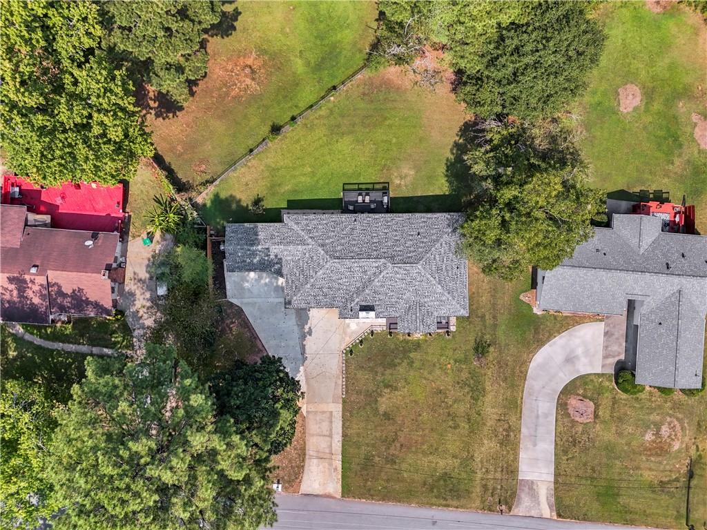 4166 Idlevale Drive Tucker, GA 30084 - Photo 9 of 36 an aerial view of residential houses with outdoor space