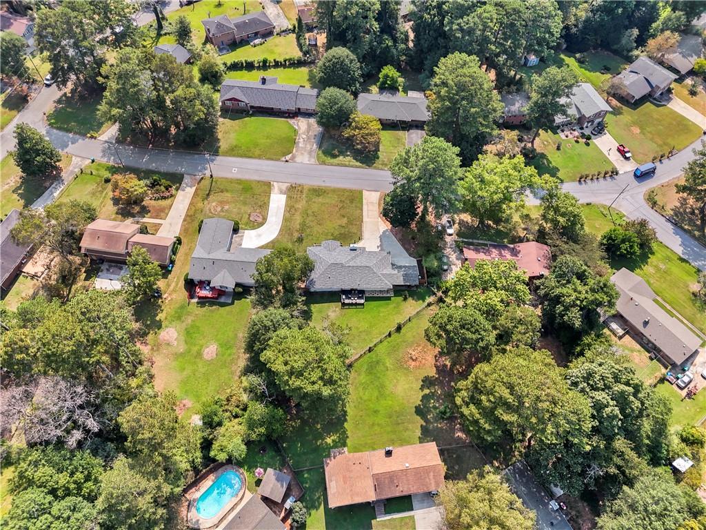 4166 Idlevale Drive Tucker, GA 30084 - Photo 10 of 36 an aerial view of a house with a yard swimming pool and outdoor seating