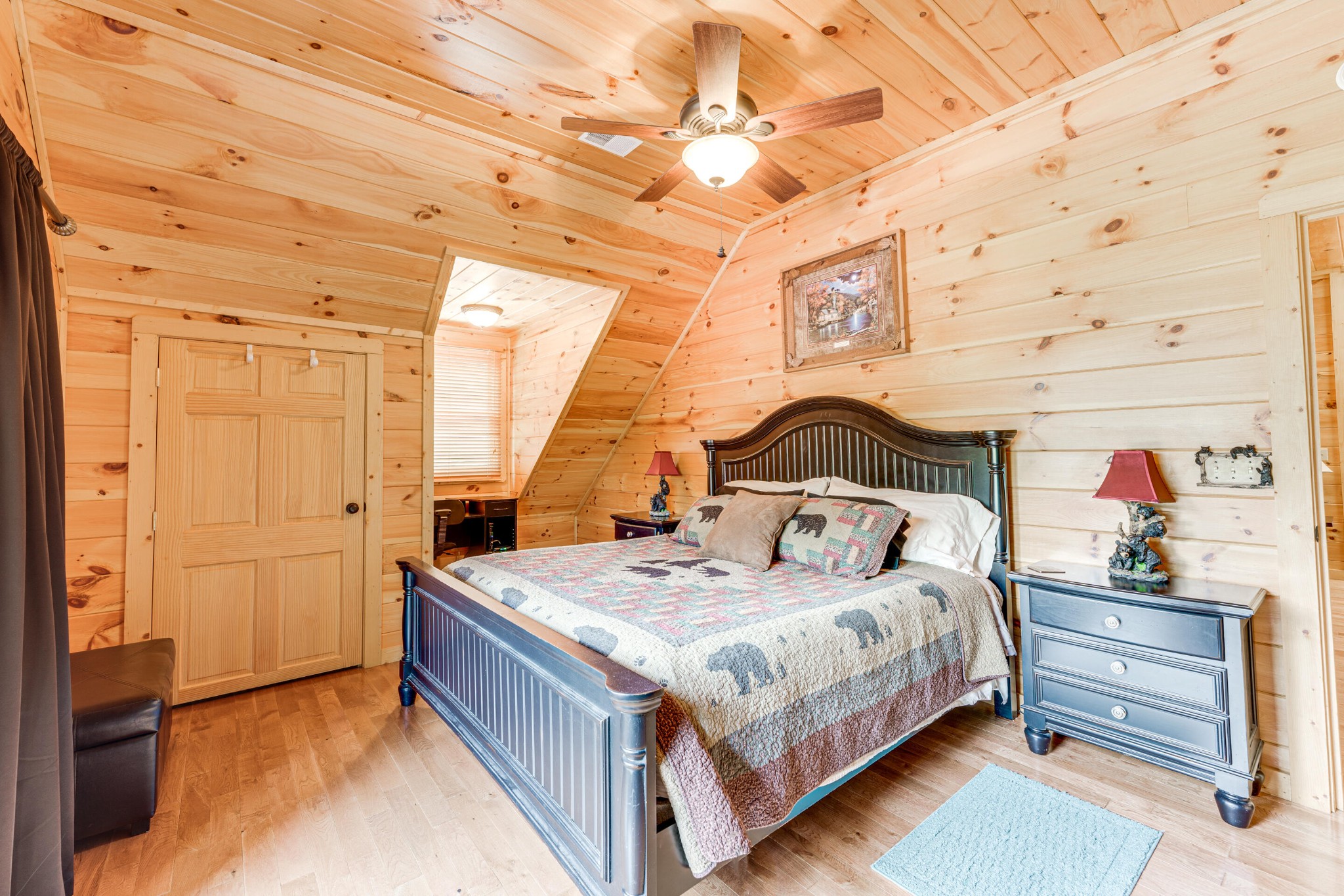 2740 Waldens Creek Road Sevierville, TN 37862 - Photo 13 of 40 a bedroom with a bed and a window