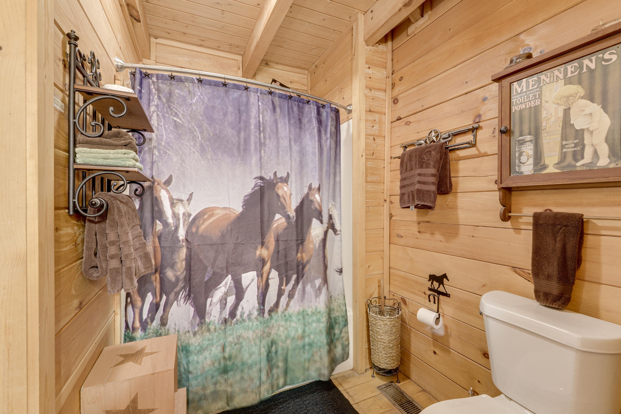 2740 Waldens Creek Road Sevierville, TN 37862 - Photo 15 of 40 a bathroom with a toilet and shower