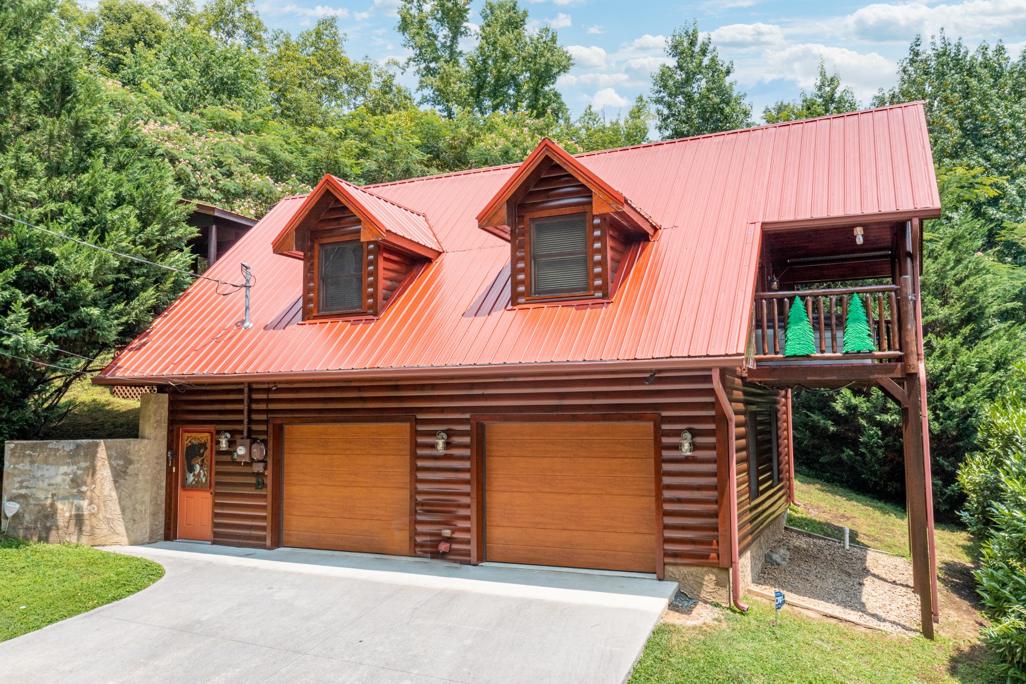2740 Waldens Creek Road Sevierville, TN 37862 - Photo 2 of 40 a front view of a house with a yard