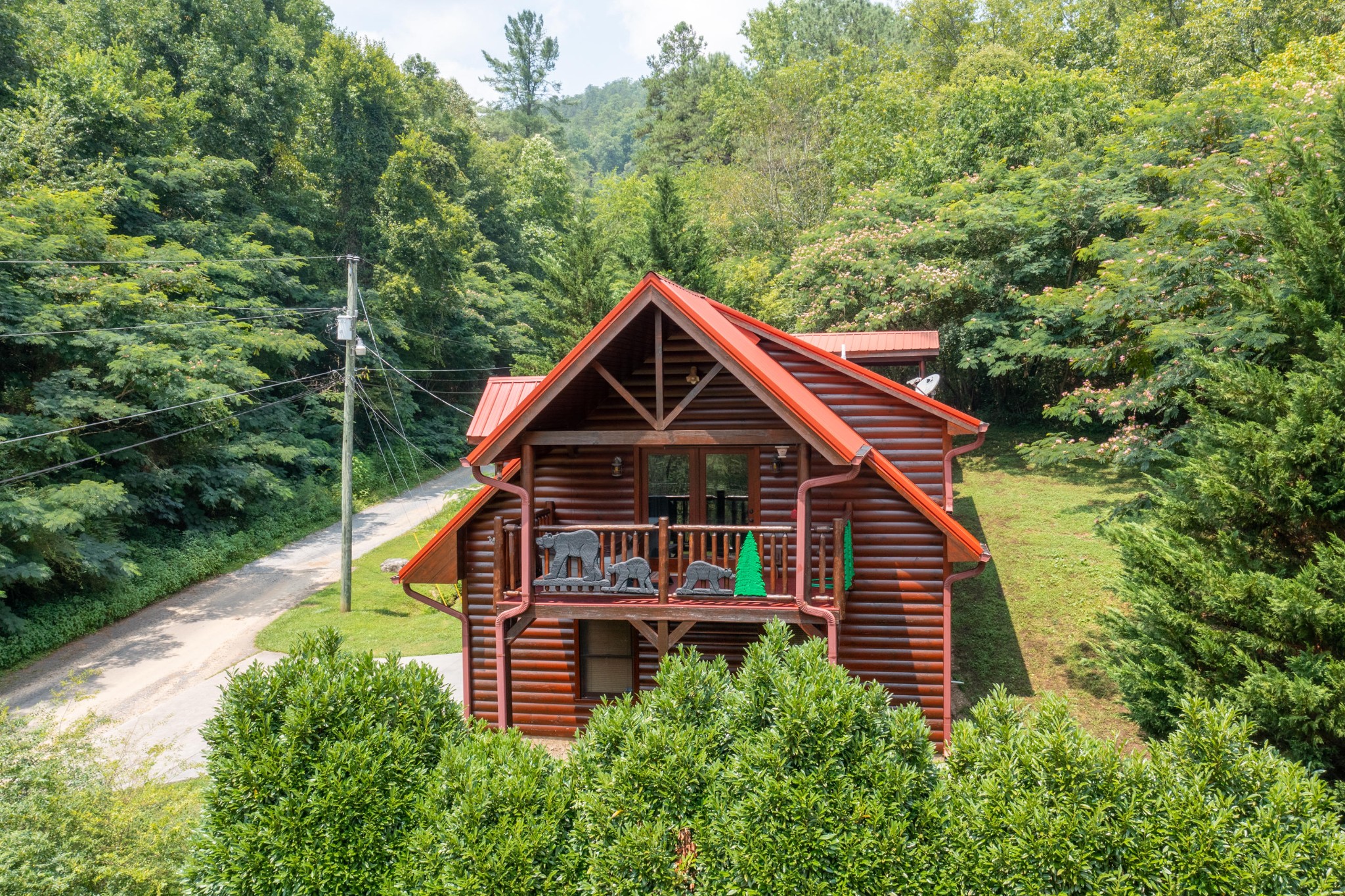 2740 Waldens Creek Road Sevierville, TN 37862 - Photo 25 of 40 a front view of a house with a yard