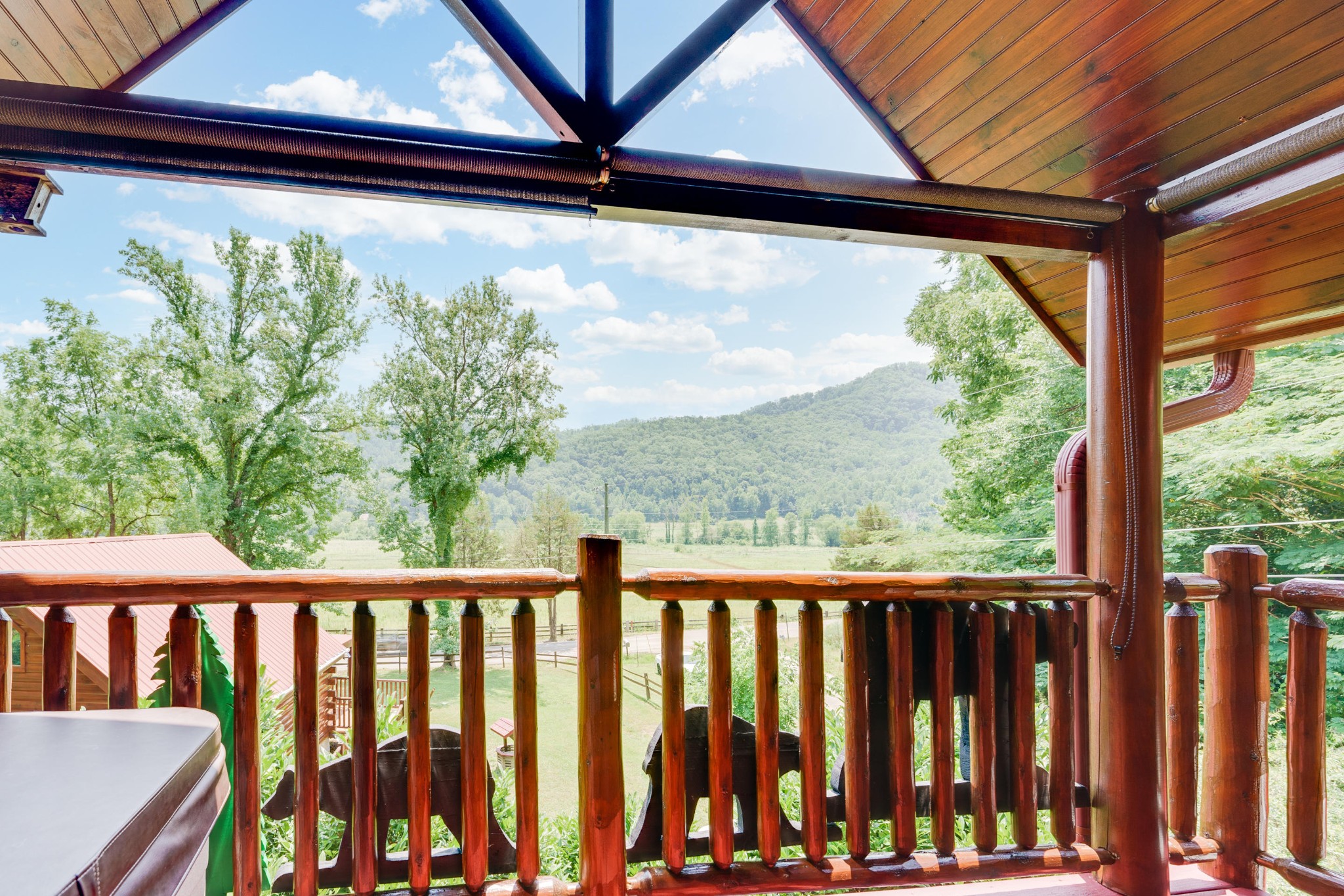 2740 Waldens Creek Road Sevierville, TN 37862 - Photo 28 of 40 a view of a balcony with street from a window