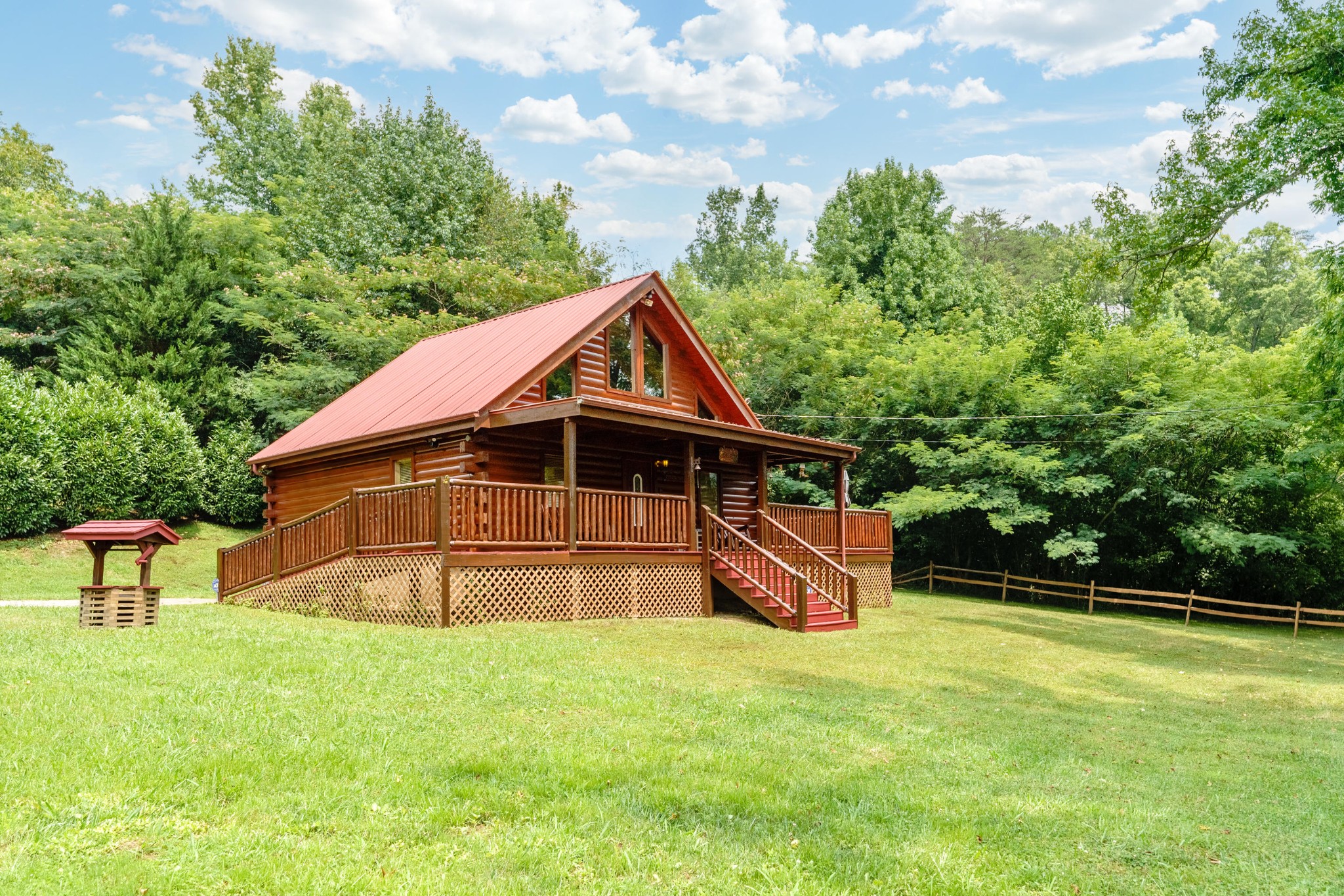2740 Waldens Creek Road Sevierville, TN 37862 - Photo 34 of 40 a view of a house with a yard balcony