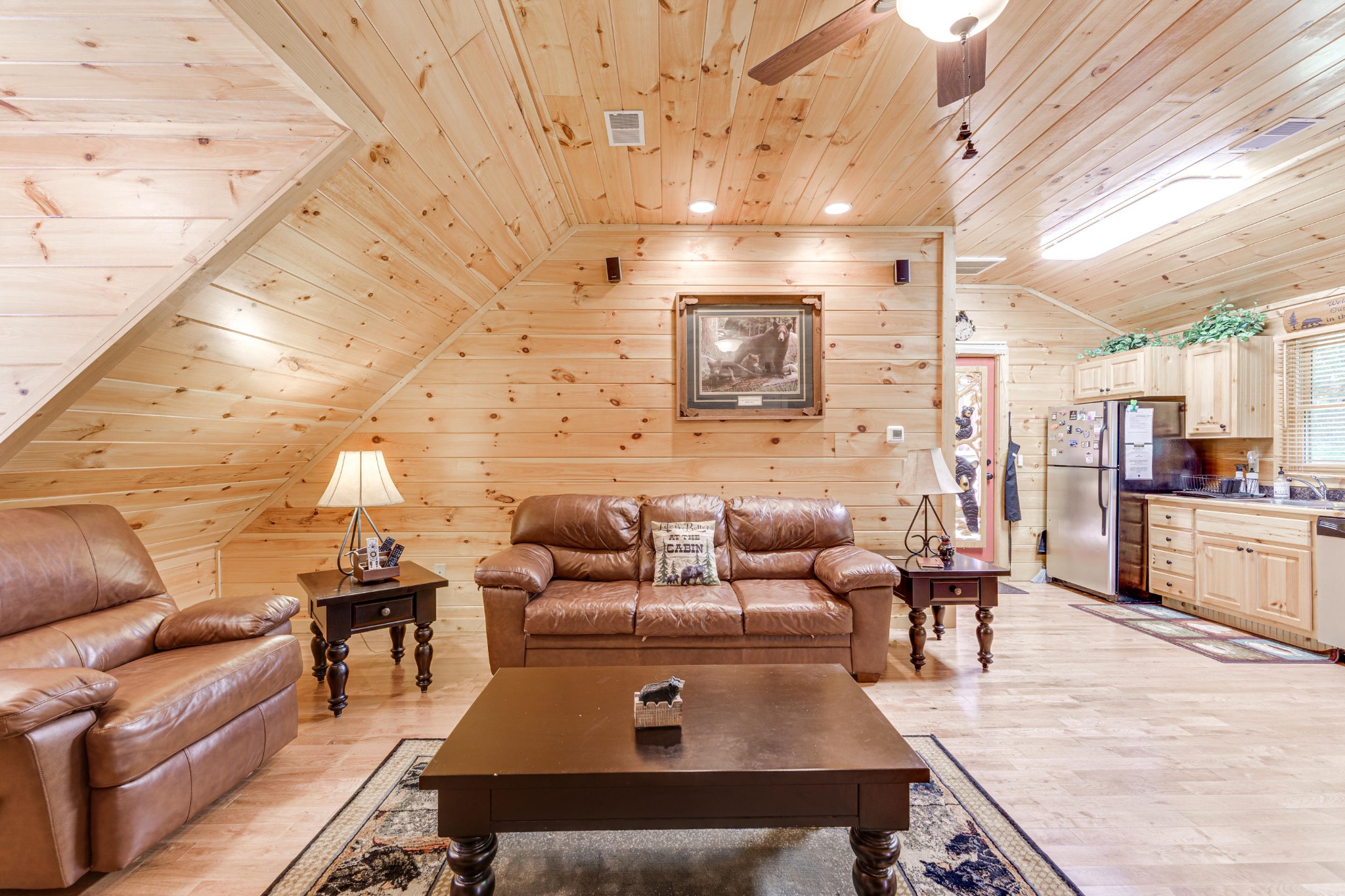 2740 Waldens Creek Road Sevierville, TN 37862 - Photo 7 of 40 a living room with furniture and a flat screen tv